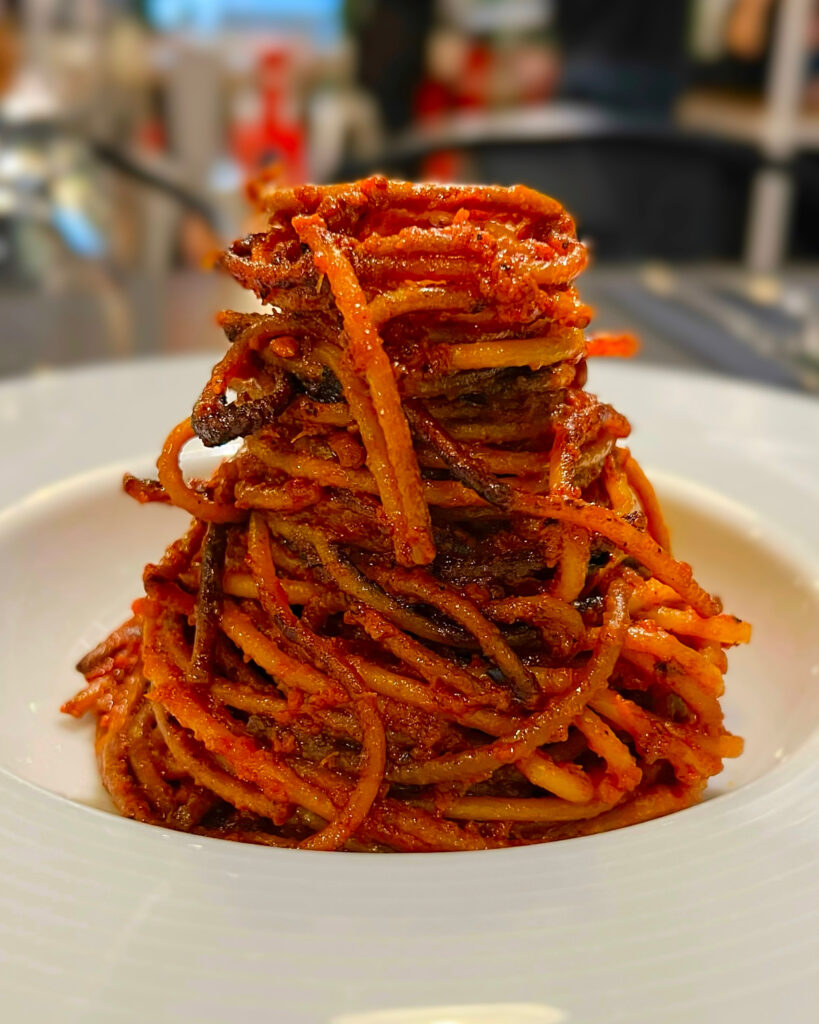 Classic spaghetti all’assassina from Urban Assassineria, Bari. Photo by the Puglia Guys for the International Assassina Accademia.